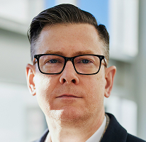 Geschäftsführer eines Krypto-Handelsunternehmens im CEO-Porträt von Alexander Hughes